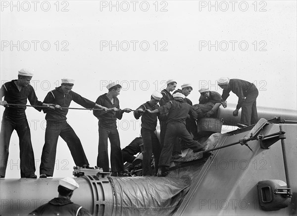 Target Practice - Cleaning 12' Gun, 1913. Creator: Unknown.