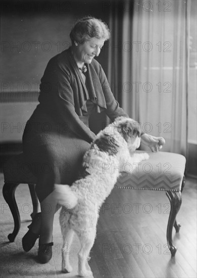 Alanson, Bertram, Mrs., with dog, portrait photograph, between 1927 and 1937. Creator: Arnold Genthe.