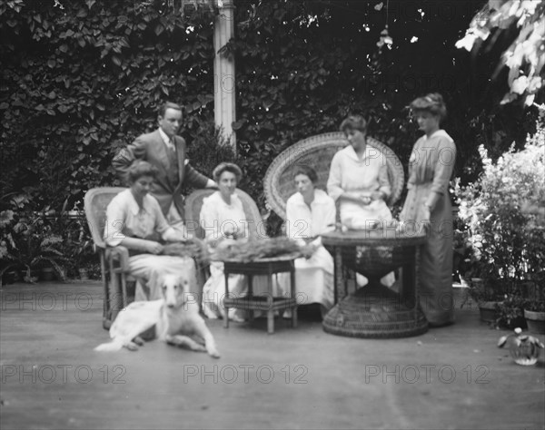 Donohoe, Mrs., and friends or family, portrait photograph taken outdoors, between 1906 and 1915. Creator: Arnold Genthe.