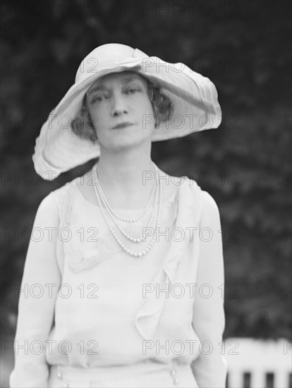 Gossler, Philip, Mrs., standing outdoors, not before 1929. Creator: Arnold Genthe.