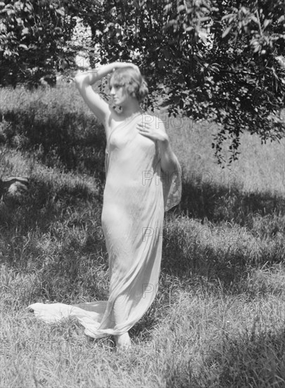 Olson, Margaret, Miss, standing outdoors, 1924 July. Creator: Arnold Genthe.