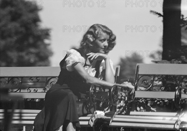 Roelof, Wilma, Miss, seated outdoors, 1932 July. Creator: Arnold Genthe.