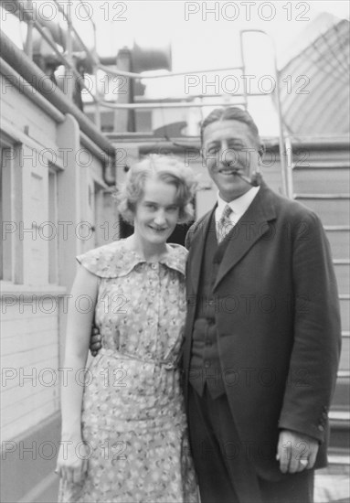 Von Lueckner, Felix, Count, and Countess, standing outdoors, 1931 June 5. Creator: Arnold Genthe.