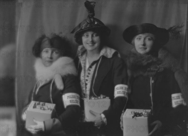 Crosbie, Violet, Miss, and other members of Polish relief group, portrait photograph, 1916. Creator: Arnold Genthe.