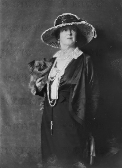 Duff-Gordon, Lady, with dog, portrait photograph, not before 1916. Creator: Arnold Genthe.