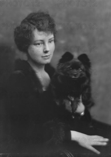 Hartshorne, Miss, with dog, portrait photograph, 1917 May 15. Creator: Arnold Genthe.