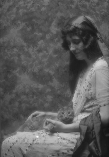 Maude, Bonnie, Miss, with Buzzer the cat, portrait photograph, between 1912 and 1918. Creator: Arnold Genthe.