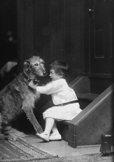 Plottner boy with dog, portrait photograph, 1907 Oct. 16. Creator: Arnold Genthe.