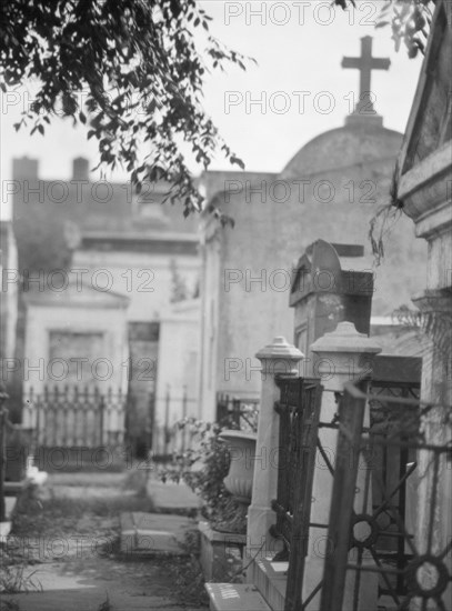 Tombs in St. Louis Cemetery, New Orleans, between 1920 and 1926. Creator: Arnold Genthe.