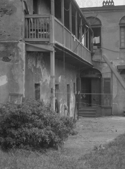 Courtyard, New Orleans, between 1920 and 1926. Creator: Arnold Genthe.