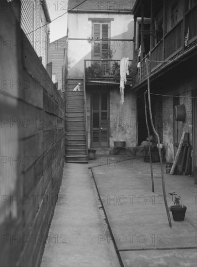 Courtyard, New Orleans, between 1920 and 1926. Creator: Arnold Genthe.