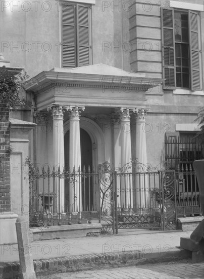 Facade of a multi-story house, New Orleans or Charleston, South Carolina, between 1920 and 1926. Creator: Arnold Genthe.