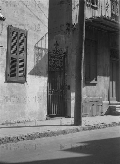 Facades of multi-story houses, New Orleans or Charleston, South Carolina, between 1920 and 1926. Creator: Arnold Genthe.