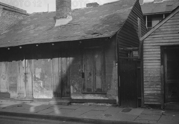 Houses in the French Quarter, New Orleans, between 1920 and 1926. Creator: Arnold Genthe.