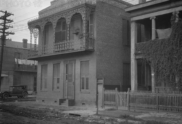 Two-story houses, New Orleans, between 1920 and 1926. Creator: Arnold Genthe.