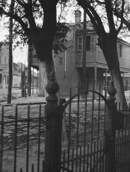 Triangular Bar, Magazine Street, New Orleans, between 1920 and 1926. Creator: Arnold Genthe.