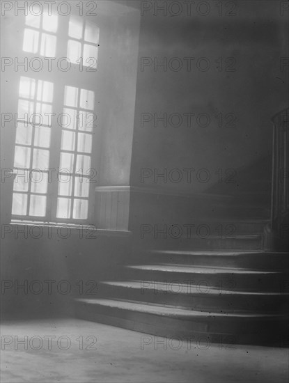 Window and stairway of the old Ursuline convent, New Orleans, between 1920 and 1926. Creator: Arnold Genthe.