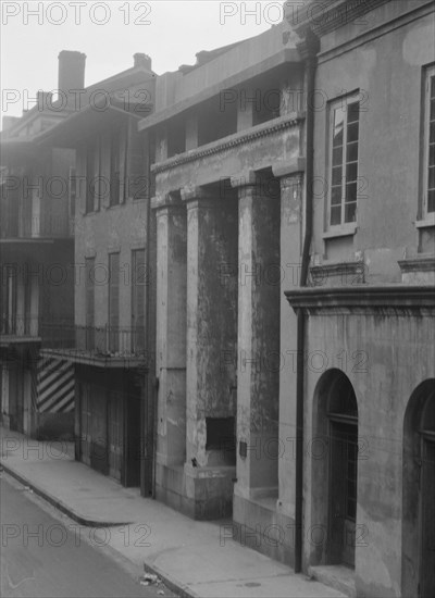 Buildings, including the Arsenal, along St. Peter Street, New Orleans, between 1920 and 1926. Creator: Arnold Genthe.