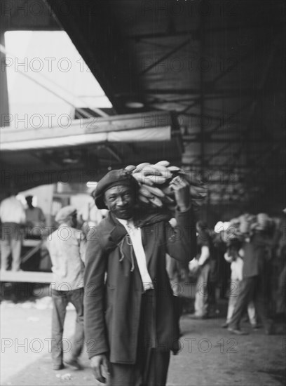 Unloading bananas, New Orleans, between 1920 and 1926. Creator: Arnold Genthe.