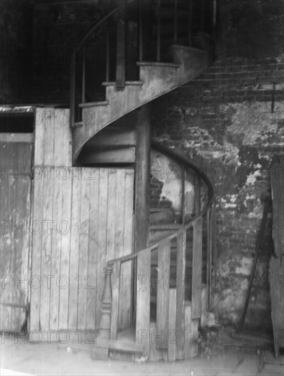 Spiral stairway, New Orleans, between 1920 and 1926. Creator: Arnold Genthe.