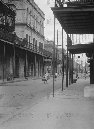 View down Royal Street to the "Haunted House" (Lalaurie House), New Orleans, between 1920 and 1926. Creator: Arnold Genthe.