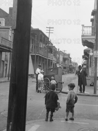 Organ grinder, New Orleans, between 1920 and 1926. Creator: Arnold Genthe.