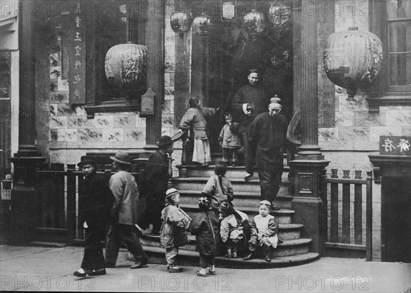 In front of the Joss House, Chinatown, San Francisco, between 1896 and 1906. Creator: Arnold Genthe.