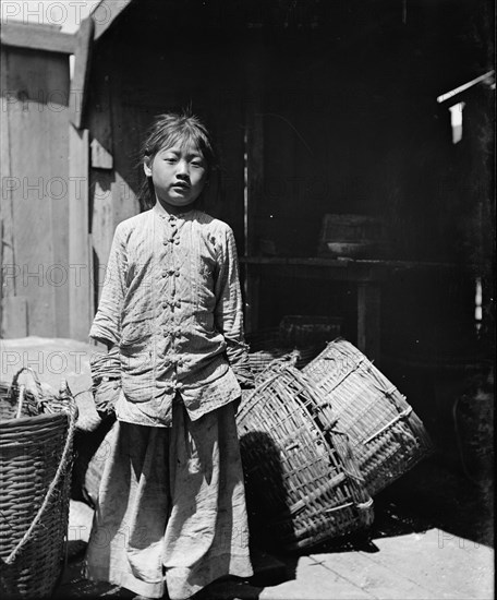 The fish dealer's daughter, Chinatown, San Francisco, between 1896 and 1906. Creator: Arnold Genthe.