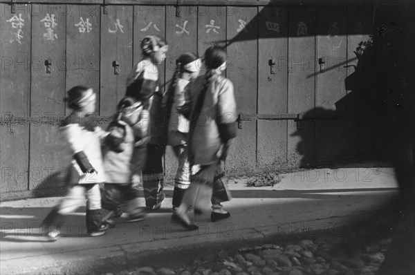 Five girls in holiday finery, Chinatown, San Francisco, between 1896 and 1906. Creator: Arnold Genthe.