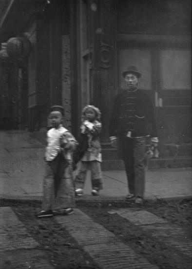 Gambling hall, Jackson Street corner, Chinatown, San Francisco, between 1896 and 1906. Creator: Arnold Genthe.