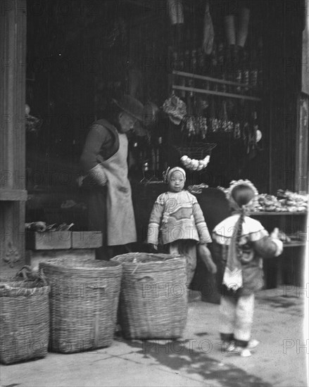 The grocery store, Chinatown, San Francisco, between 1896 and 1906. Creator: Arnold Genthe.