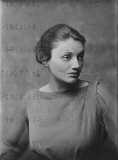 Miss Katharine Cornell, with dog, portrait photograph, 1917 Nov. 20. Creator: Arnold Genthe.