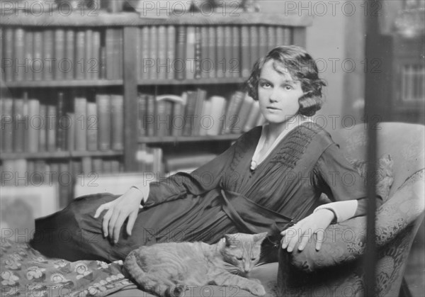 Miss Helen Chamberlain, with Buzzer the cat, portrait photograph, 1918 May 28. Creator: Arnold Genthe.