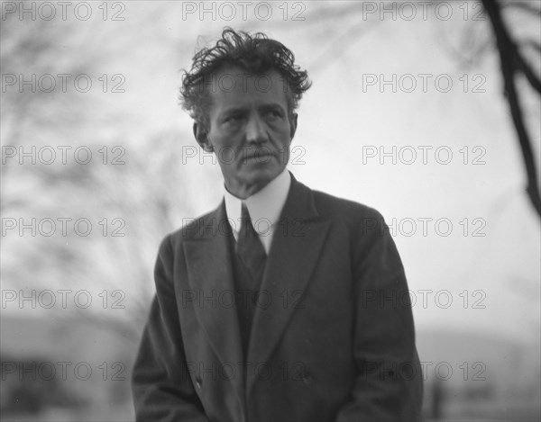 Portrait photograph of Arnold Genthe taken outdoors, between 1911 and 1942. Creator: Arnold Genthe.