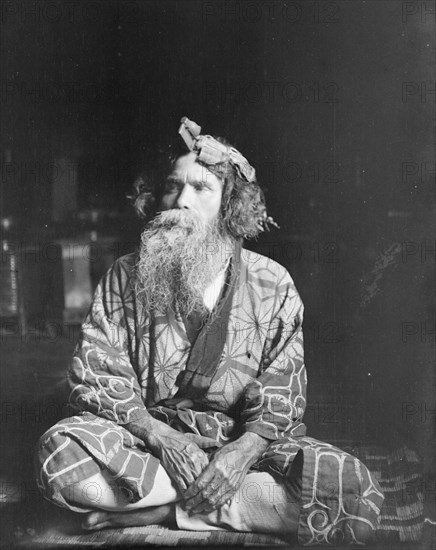 Ainu chief wearing a headdress, 1908. Creator: Arnold Genthe.