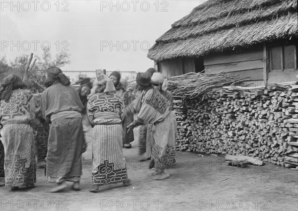 Crane dance of the Ainu women, 1908. Creator: Arnold Genthe.