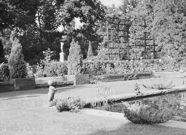 Garden, East Hampton, Long Island, between 1933 and 1942. Creator: Arnold Genthe.