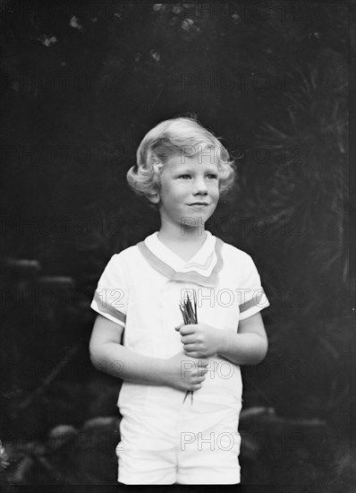 Son of W.G. Kimball, standing outdoors, between 1911 and 1942. Creator: Arnold Genthe.