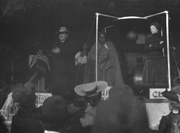 Sidewalk performance or carnival performance, Cliff Dwellers, between 1896 and 1911. Creator: Arnold Genthe.