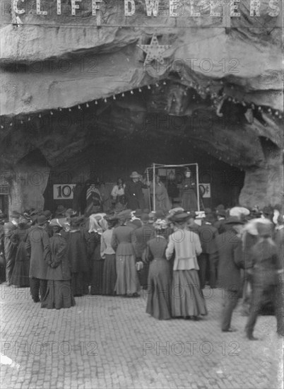 Sidewalk performance or carnival performance, Cliff Dwellers, between 1896 and 1911. Creator: Arnold Genthe.