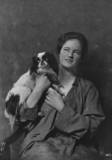 Miss Lisa Stillman, with dog, portrait photograph, 1918 Apr. 5. Creator: Arnold Genthe.
