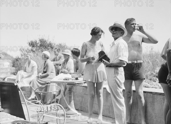 Unidentified group of people, possibly members of the Jewett family, standing or sitting..., c1911-1 Creator: Arnold Genthe.