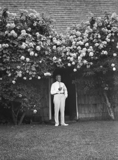 Professor Robert Wood, standing outdoors, 1932. Creator: Arnold Genthe.