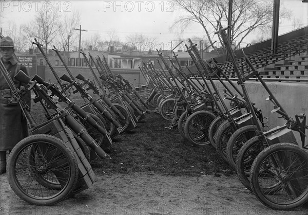 Marine Corps, U.S.N. Machine Gun Unit Demonstration at Ball Park, 1917. Creator: Harris & Ewing.