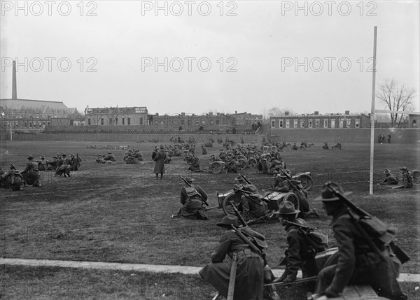 Marine Corps, U.S.N. Machine Gun Unit Demonstration at Ball Park, 1917. Creator: Harris & Ewing.