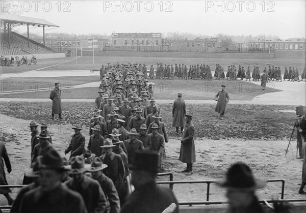 Marine Corps, U.S.N. Machine Gun Unit Demonstration at Ball Park, 1917. Creator: Harris & Ewing.