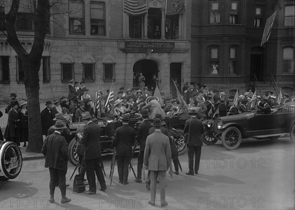 Rankin, Jeanette I.E. Jeannette, Rep. from Montana, 1917-1919 in Car Surrounded By Suffragettes,1917 Creator: Harris & Ewing.