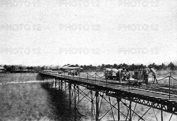 ''Grand Bassam. Le wharf; L'Ouest Africain', 1914. Creator: Unknown.