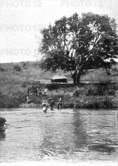 ''Traversee d'une riviere abyssine (le Motjo) par une caravane; Le Nord-Est Africain', 1914. Creator: Charles Chusseau-Flaviens.