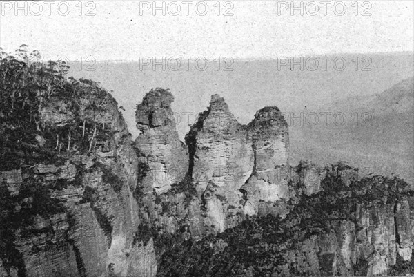 ''Les Trois Soeurs dans les Montagnes Bleues; Les Terres Du Pacifique', 1914. Creator: Unknown.